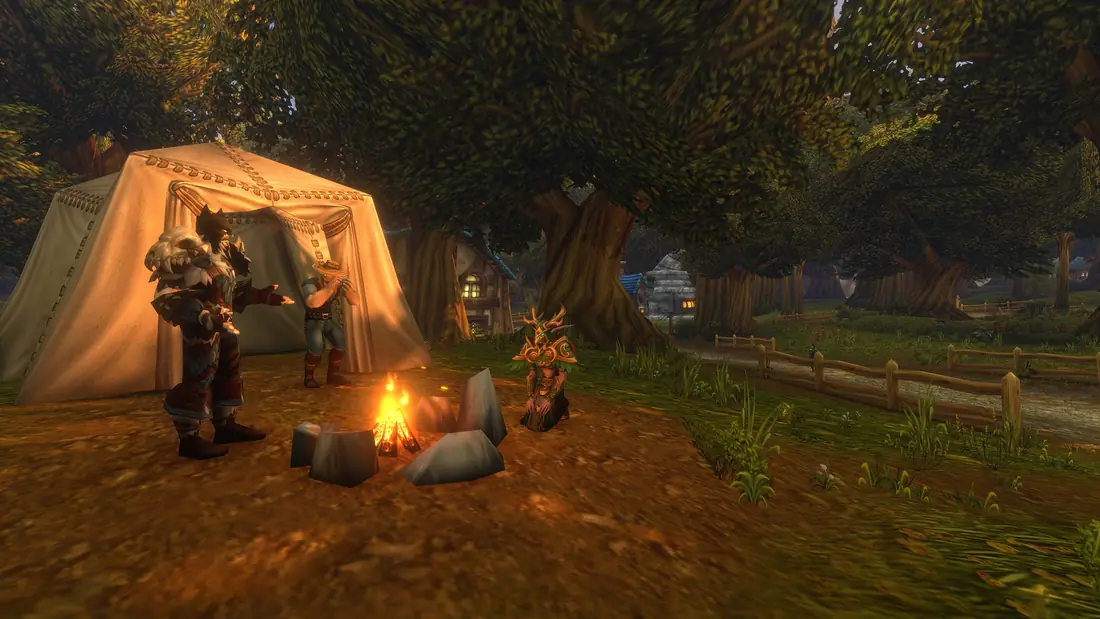 Players resting at a campfire beside a tent